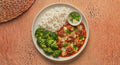 Napoli — turkey meatballs in marinara with melted cheese and fresh basil, served with steamed broccoli and jasmine rice