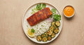Osaka - seared wild-caught salmon over jasmine rice with blistered zucchini and boom boom sauce