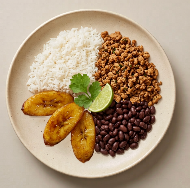 Venezuela — seasoned ground turkey, jasmine rice, black beans, and sweet plantains on a cream plate